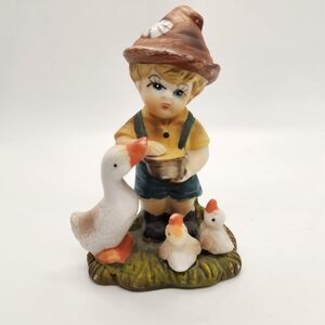 Charming Figurine of Boy with Ducks